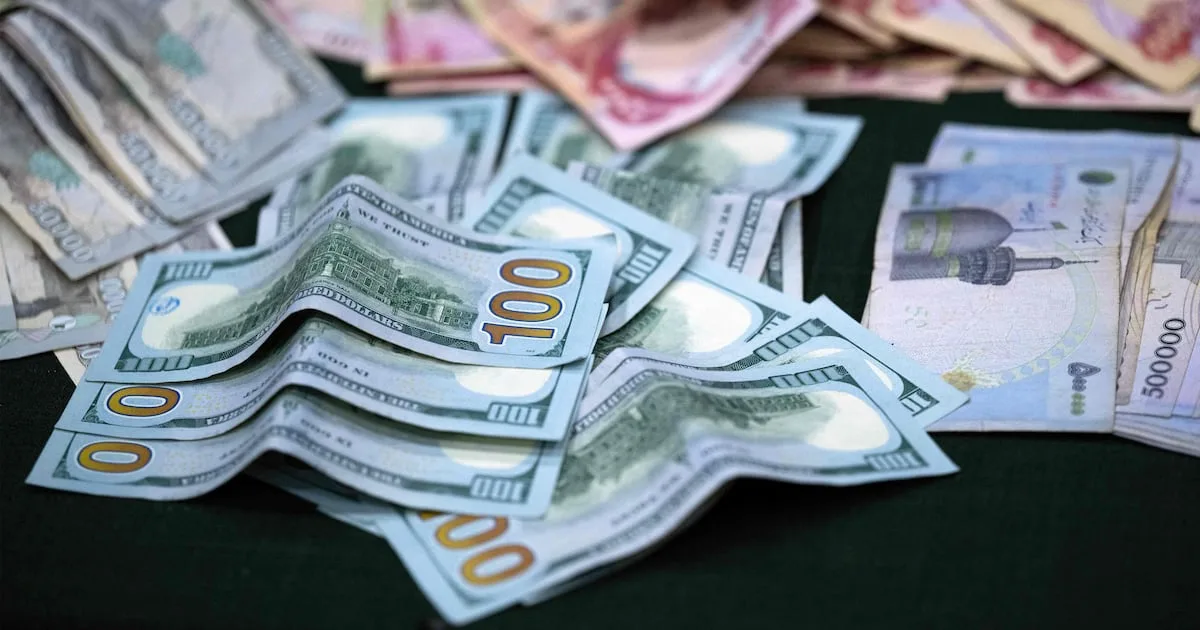 عراق نرخ ارز خود را به 1500 دینار برای هر دلار کاهش داد